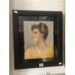 A reframed 1930's signed pastel of a young lady