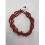 A coral necklace with 9ct gold and pearl clasp