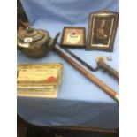 A quantity of war related items, including a silver photo frame,