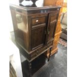 A rosewood cabinet on stand