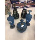 A pair of blue glass overlay vases Greek key design and a matching lidded pot (A/F)