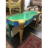 An art deco style Egyptian inspired consul table,