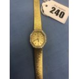 A 14ct hallmarked gold ladies 'Universal Geneve' watch
