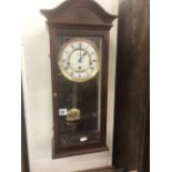 A chiming wall clock,