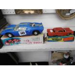 A Clifford series boxed Ford GT40 friction car and another Hong Kong manufactured friction model of