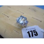 An 18ct white gold aquamarine and diamond ring, aquamarine 7ct,