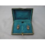 A pair of heart shaped drop earrings set with sapphires and pearls