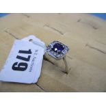 A white metal marked 18ct art deco style sapphire and diamond ring,