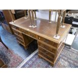 A Yewood pedestal desk