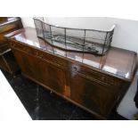 An inlaid mahogany sideboard