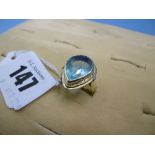 A 14ct gold blue stone ring,