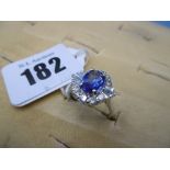 An 18ct white gold diamond and sapphire ring, sapphire 2.09ct, diamond total weight 0.