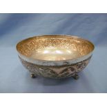 A large silver footed bowl,