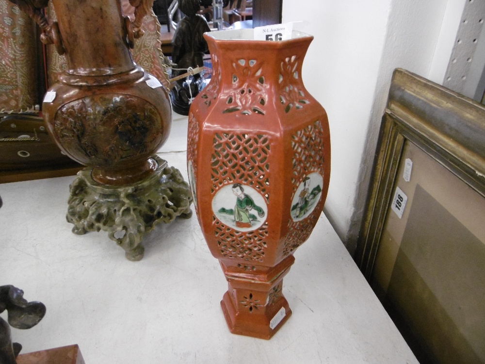 An oriental lattice vase hand painted on stand circa 1900 possible Chinese but unmarked