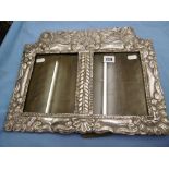 A large double sterling silver photo frame