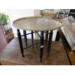 A brass benaris table