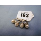 A pair of silver and baroque pearl earrings