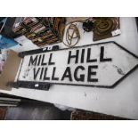 An old metal sign Mill Hill Village