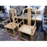 A pair of oriental carver chairs