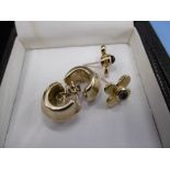 A pair of 18ct yellow gold earrings and one other pair of yellow metal earrings (one marked 18k)