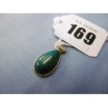 A 14ct gold pendant, possible set with Jade,