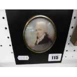 A framed miniature of a gentleman in ebony frame