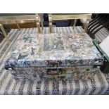 An old tin trunk decorated with decoupage