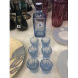 An art deco blue glass liquor set circa 1930