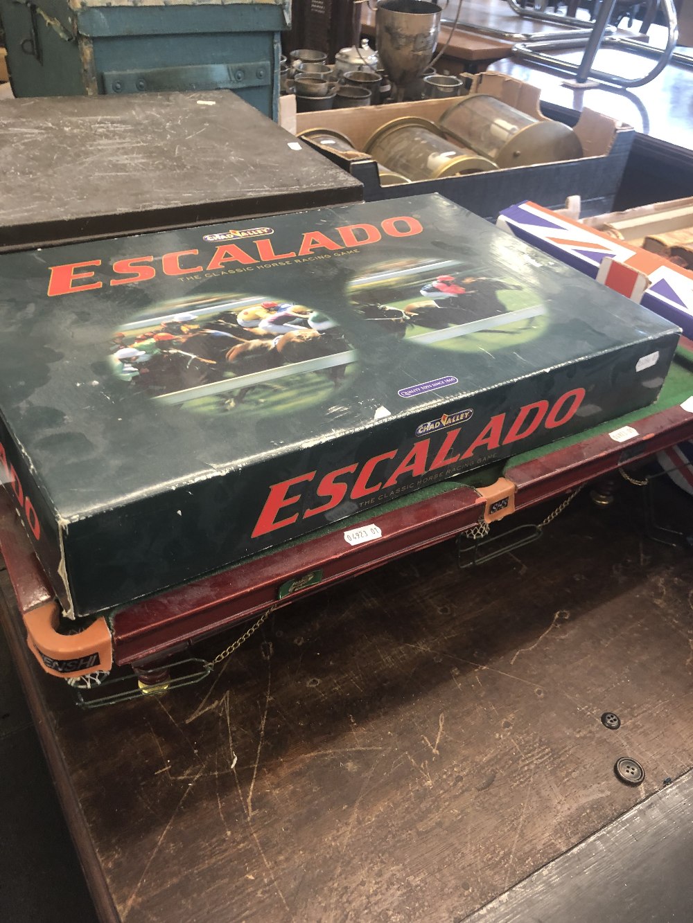 An Escalado game and miniature pool table