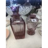 An art deco cranberry glass decanter and cocktail shaker