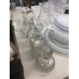 Four assorted decanters