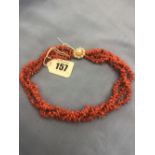 A coral necklace with 9ct gold and pearl clasp