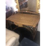 A ladies bamboo and rattan writing desk