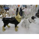 Two cast metal dogs