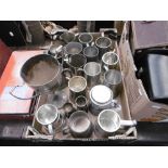 A quantity of pewter tankards etc.