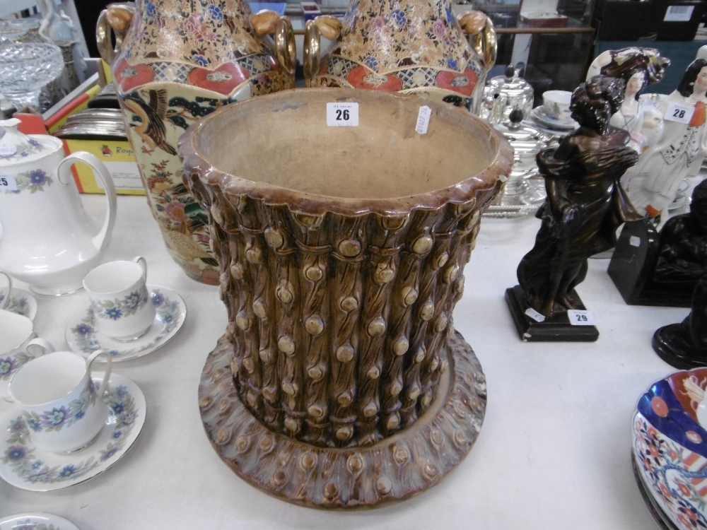 A glazed pottery jardiniere