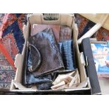 A box of assorted leather handbags