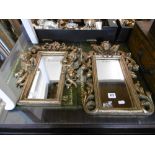 Two gilt mirrors with puttis