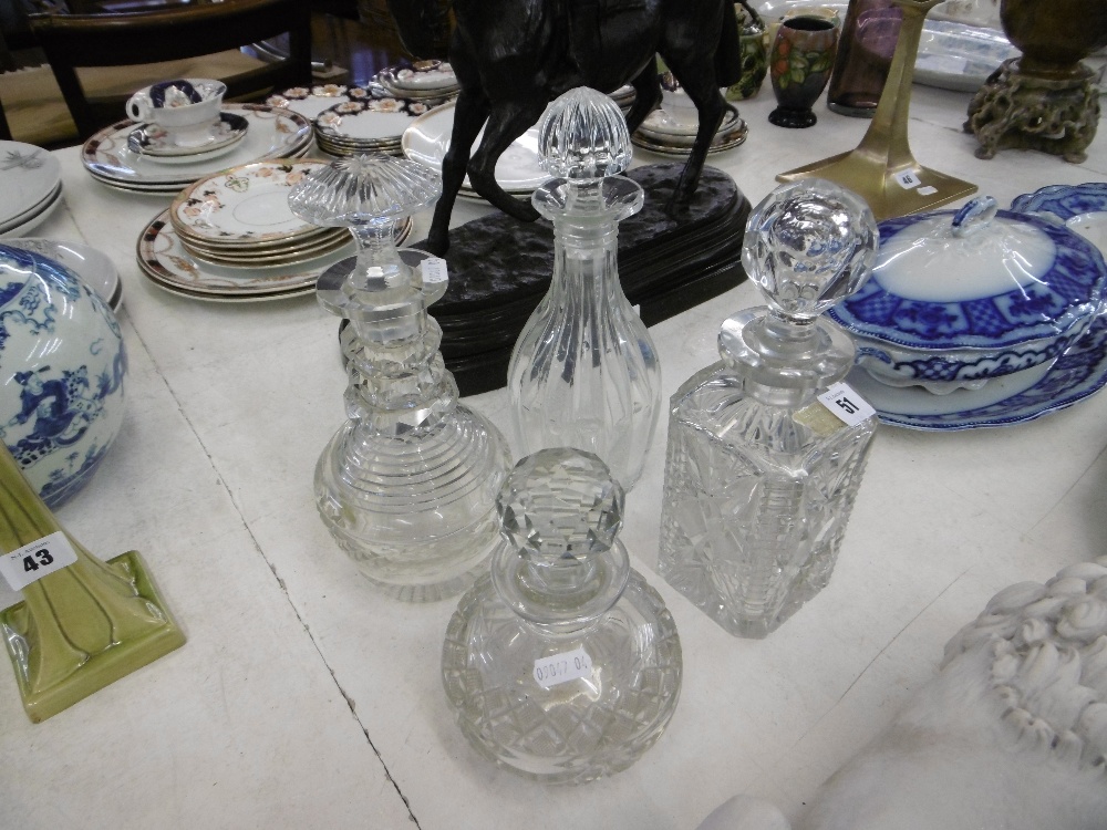 Four assorted decanters