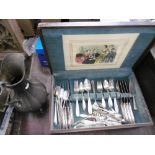 A canteen of silver plated cutlery and a silver plated jug