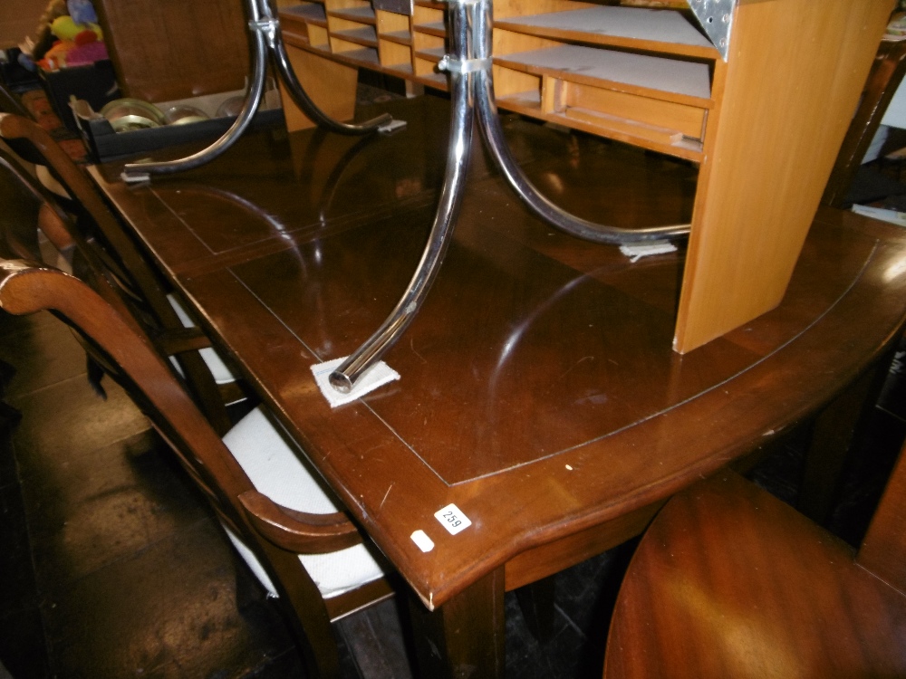 A contemporary extending dining table with two leaves, - Image 3 of 6