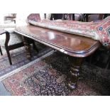 A 19th centuy mahogany extending table with leaf