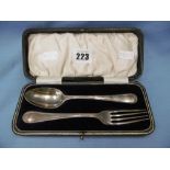 A boxed hallmarked silver spoon and fork set