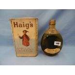 A boxed bottle of Dimple Haigs whisky "late George V" circa 1940