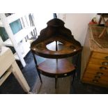 A late 18th century mahogany inlaid corner washstand