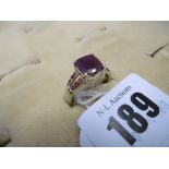 A 9ct gold ruby set ring size O
