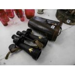 A cased pair of WW2 navel binoculars Barr & Stroud Glasgow