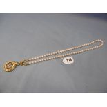 A pearl necklace with continental 18ct gold, diamond,