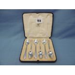 A boxed set of Mappin & Webb hallmarked silver demitasse spoons Sheffield 1938