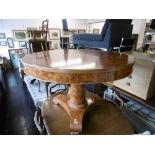 A burr walnut pedestal table